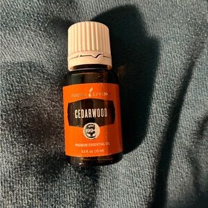 Young Living Cedarwood Essential Oil - Orange and Black Bottle